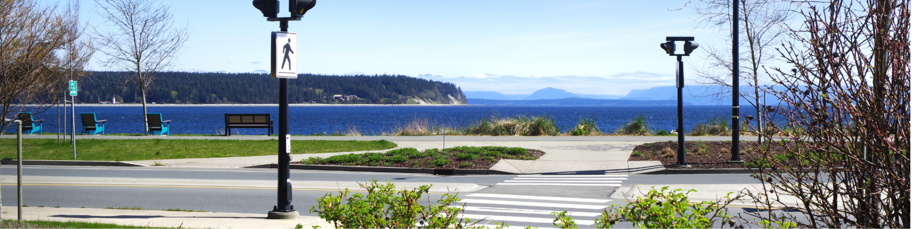 Pedestrian crosswalk going towards the Seawalk with ocean in background