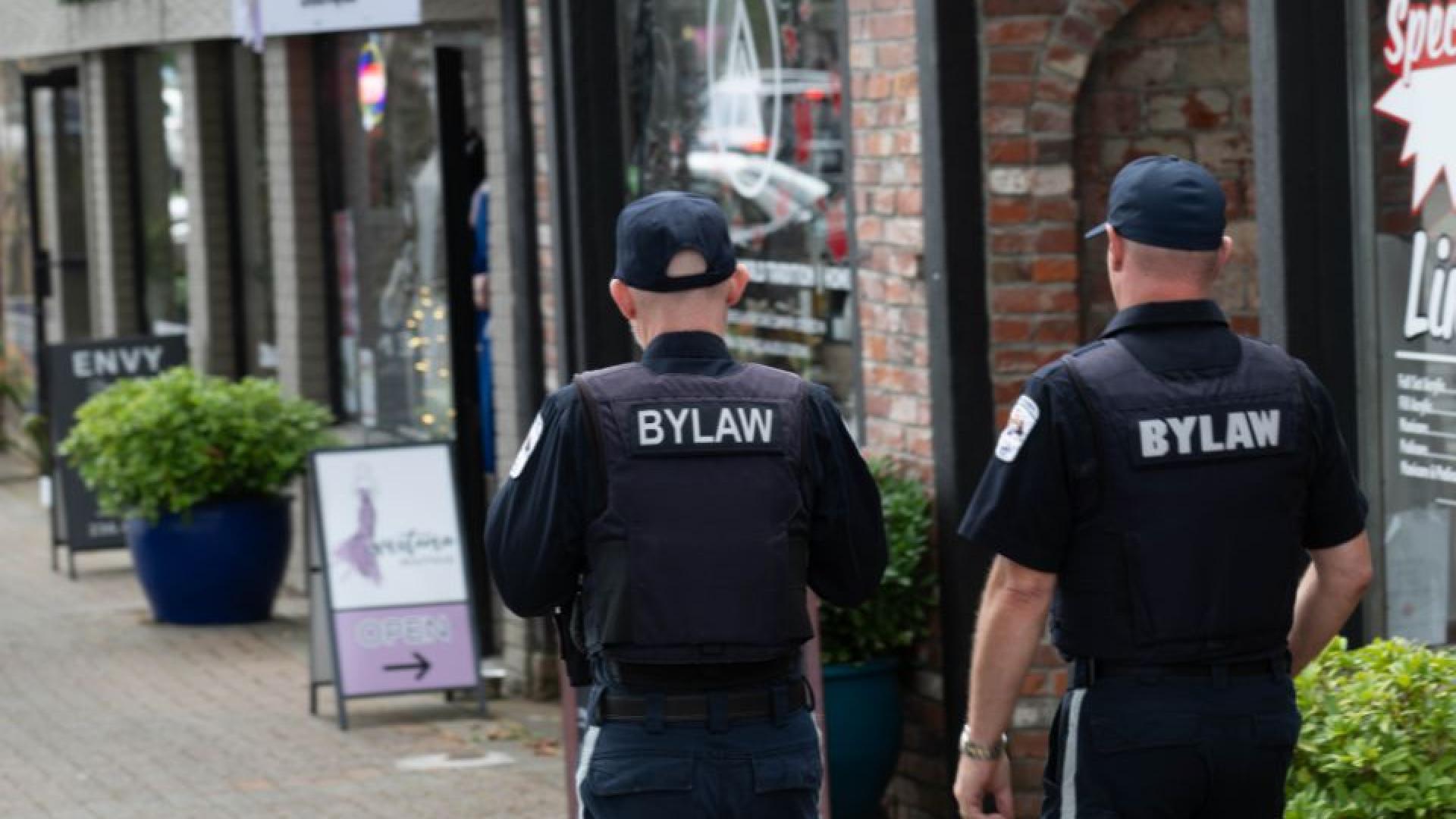 Two Bylaw officers patrol downtown Campbell River.