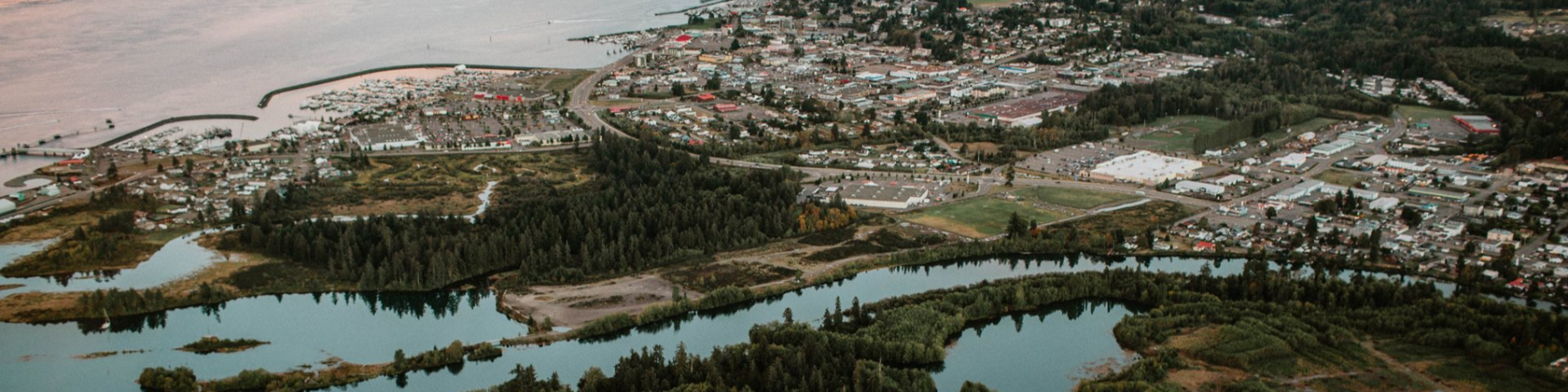 Aerial view of properties along the Campbell River and ocean